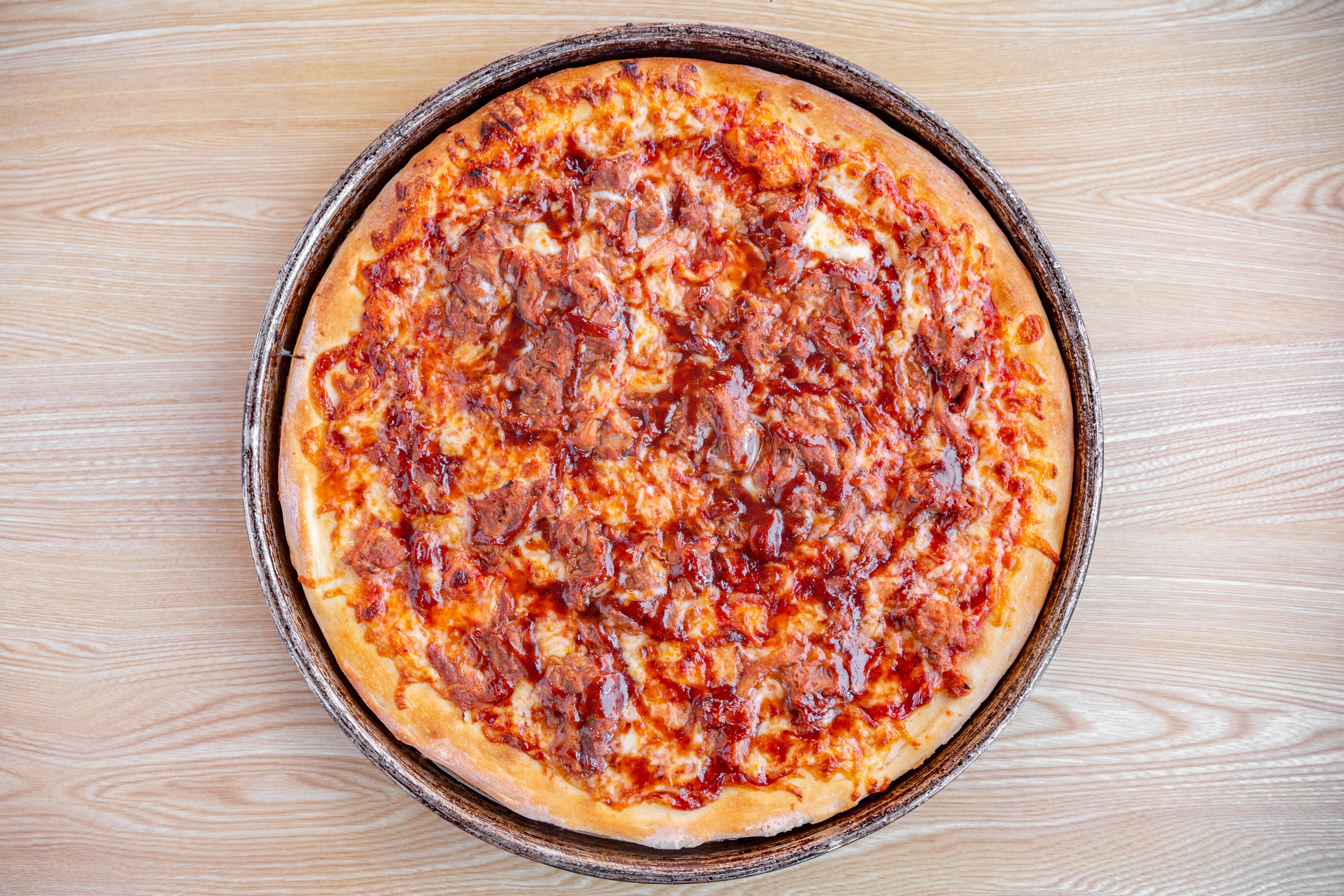 Order Meat Lover's Pizza - Small food online from Uxbridge House of Pizza store, Uxbridge on bringmethat.com