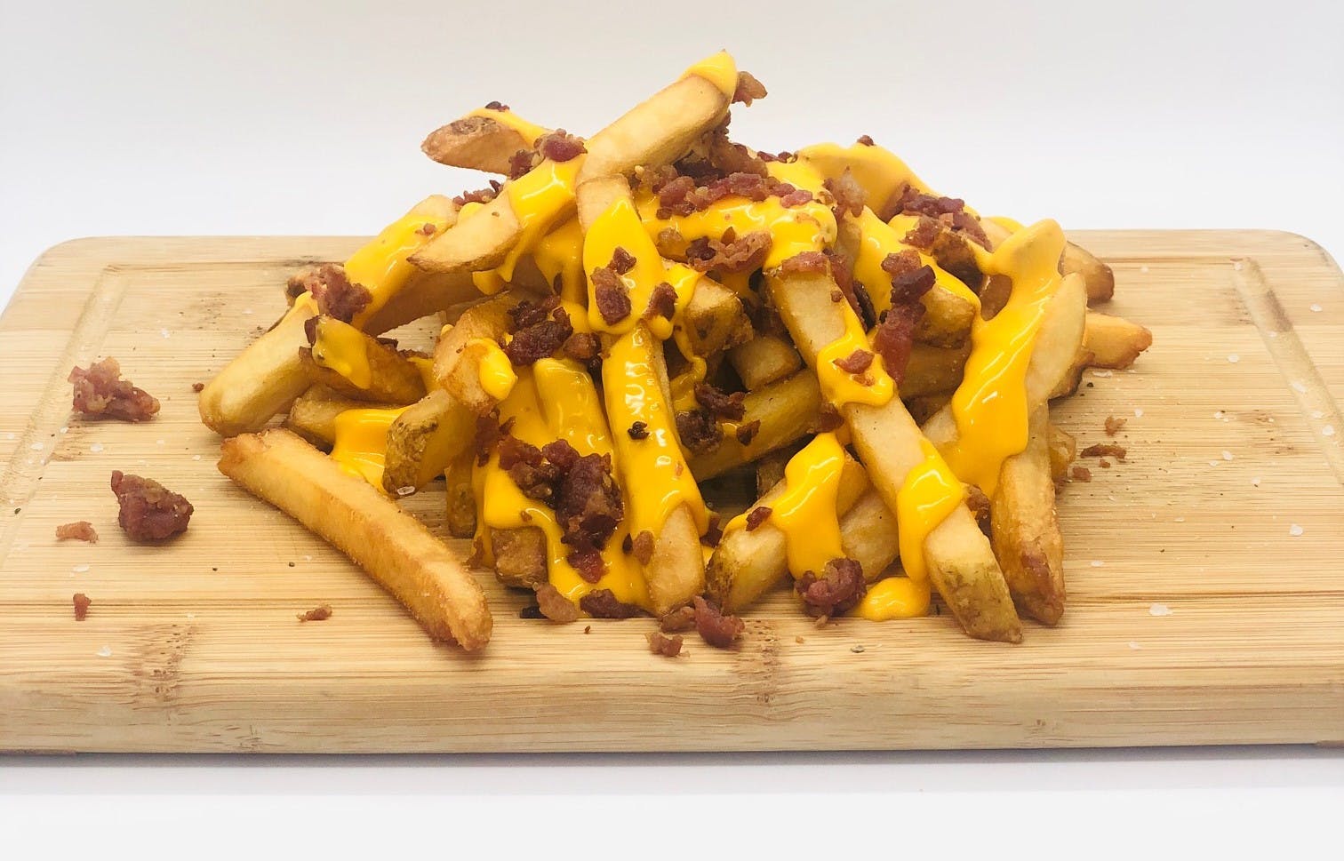 Order Cheese Fries with Bacon - Small food online from Piezano Pizza store, Ocean City on bringmethat.com