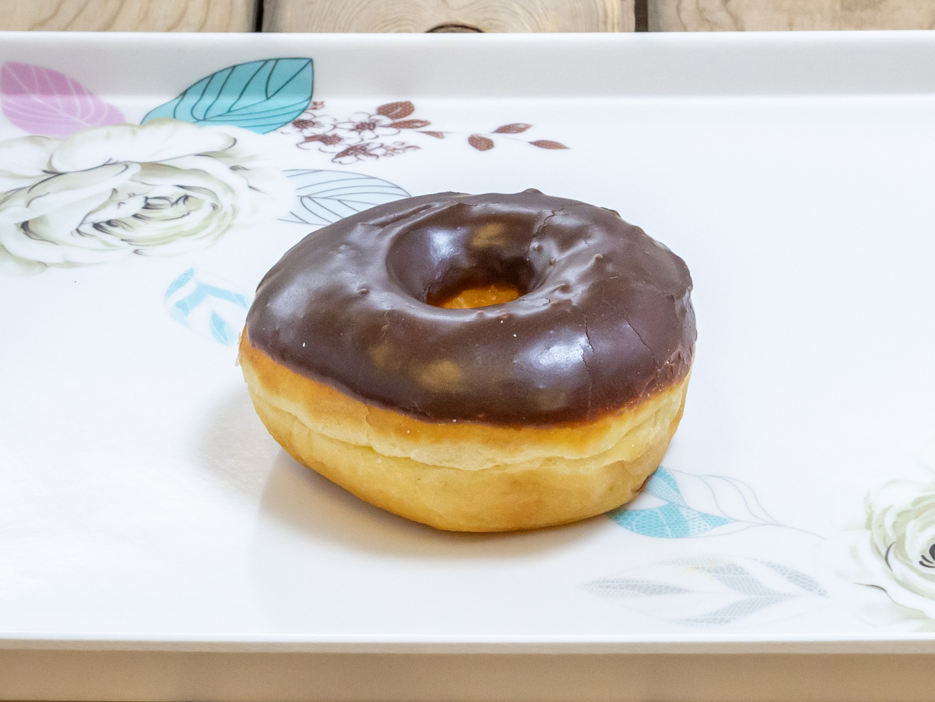 Order Chocolate Donut food online from Cotton Candy Donuts store, Dallas on bringmethat.com