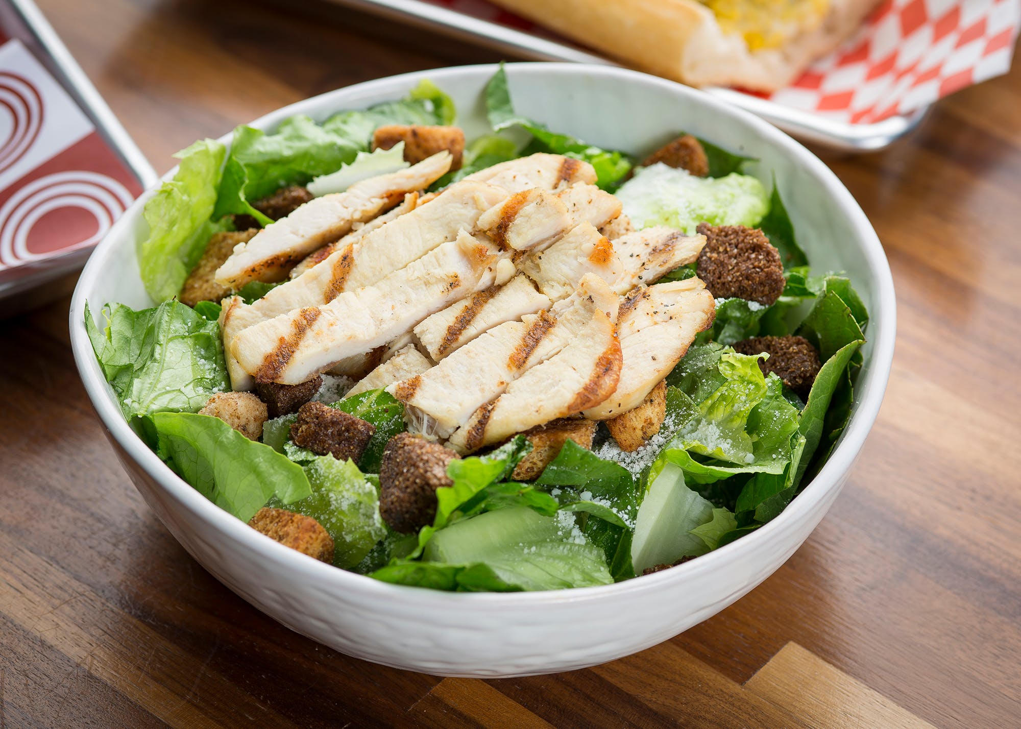 Order Caesar Salad - Salad food online from Nonna's Pizza store, La Grange on bringmethat.com