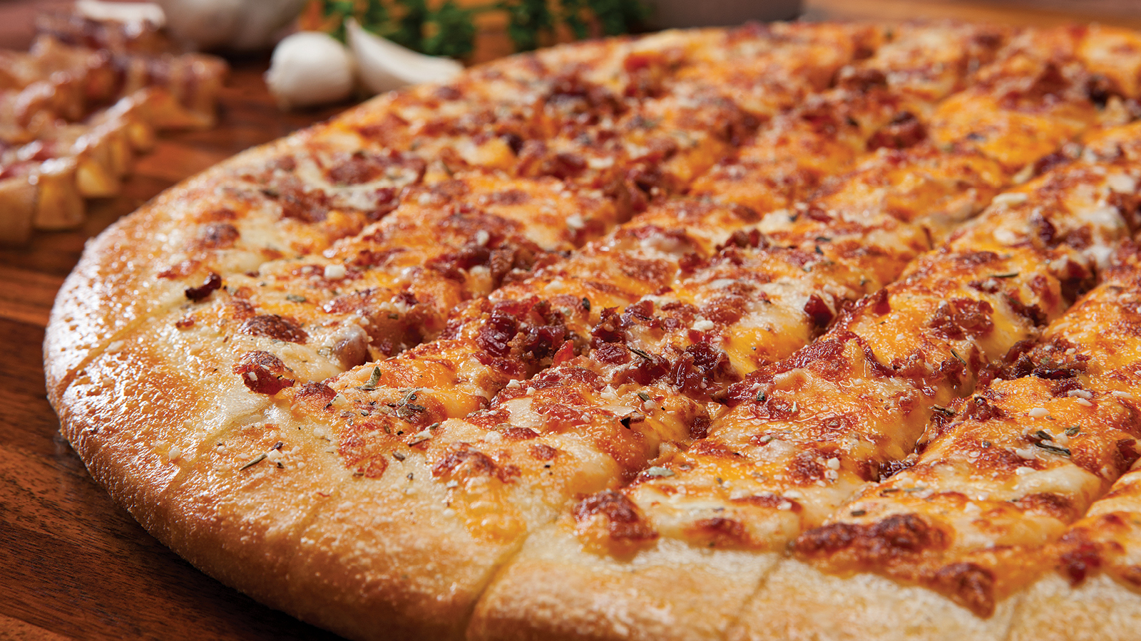 Order Cheesesticks with Bacon and Cheddar food online from Godfathers Pizza store, Cedar Rapids on bringmethat.com