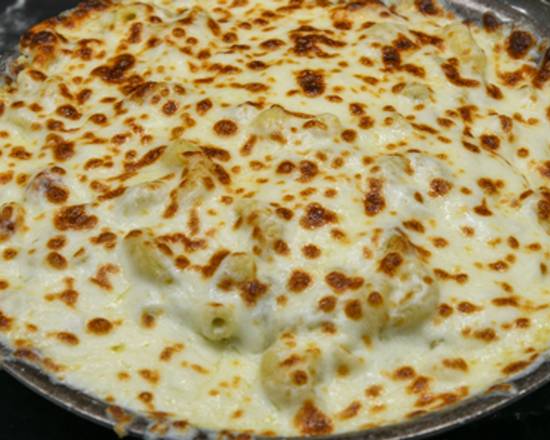 Order White Cheddar Mac & Cheese food online from Mastros Steakhouse store, Thousand Oaks on bringmethat.com