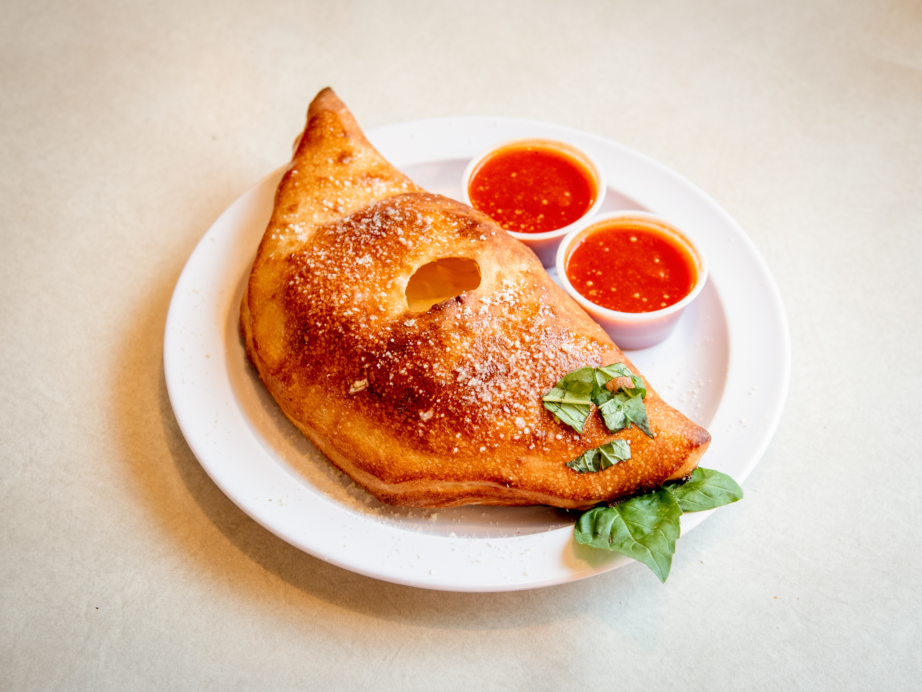 Order Calzone food online from New York Pizza store, Greensboro on bringmethat.com