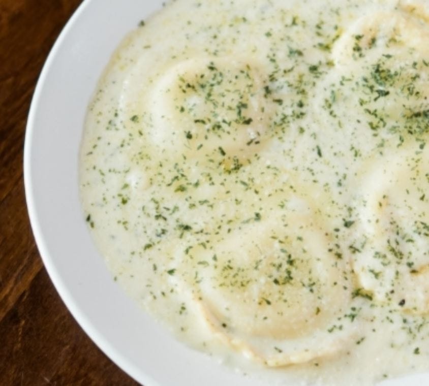 Order Cheese Ravioli - w/ Butter Sauce food online from Jonny Pizza store, Fort Worth on bringmethat.com