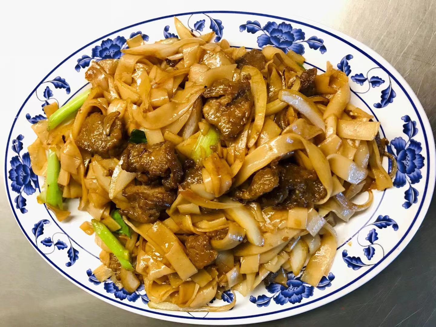 Order Beef Chow Fun food online from East Chinatown store, Modesto on bringmethat.com