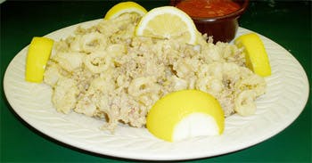 Order Calamari - Appetizer food online from Primas Pasta & Pizza Restaurant store, Fort Worth on bringmethat.com