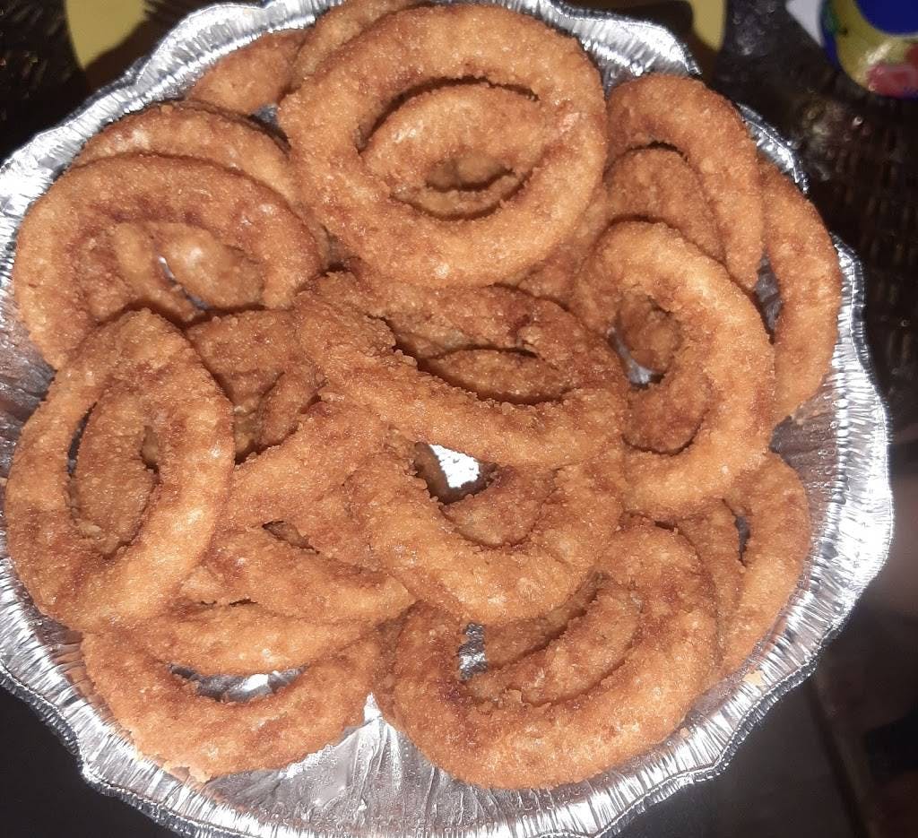Order Onion Rings - Appetizer food online from Pollo Pizza Pasta store, Greensboro on bringmethat.com