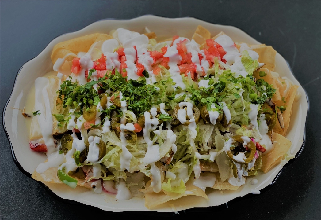Order Nachos Grandes food online from Tacos & Tequilas Mexican Grill store, Buford on bringmethat.com