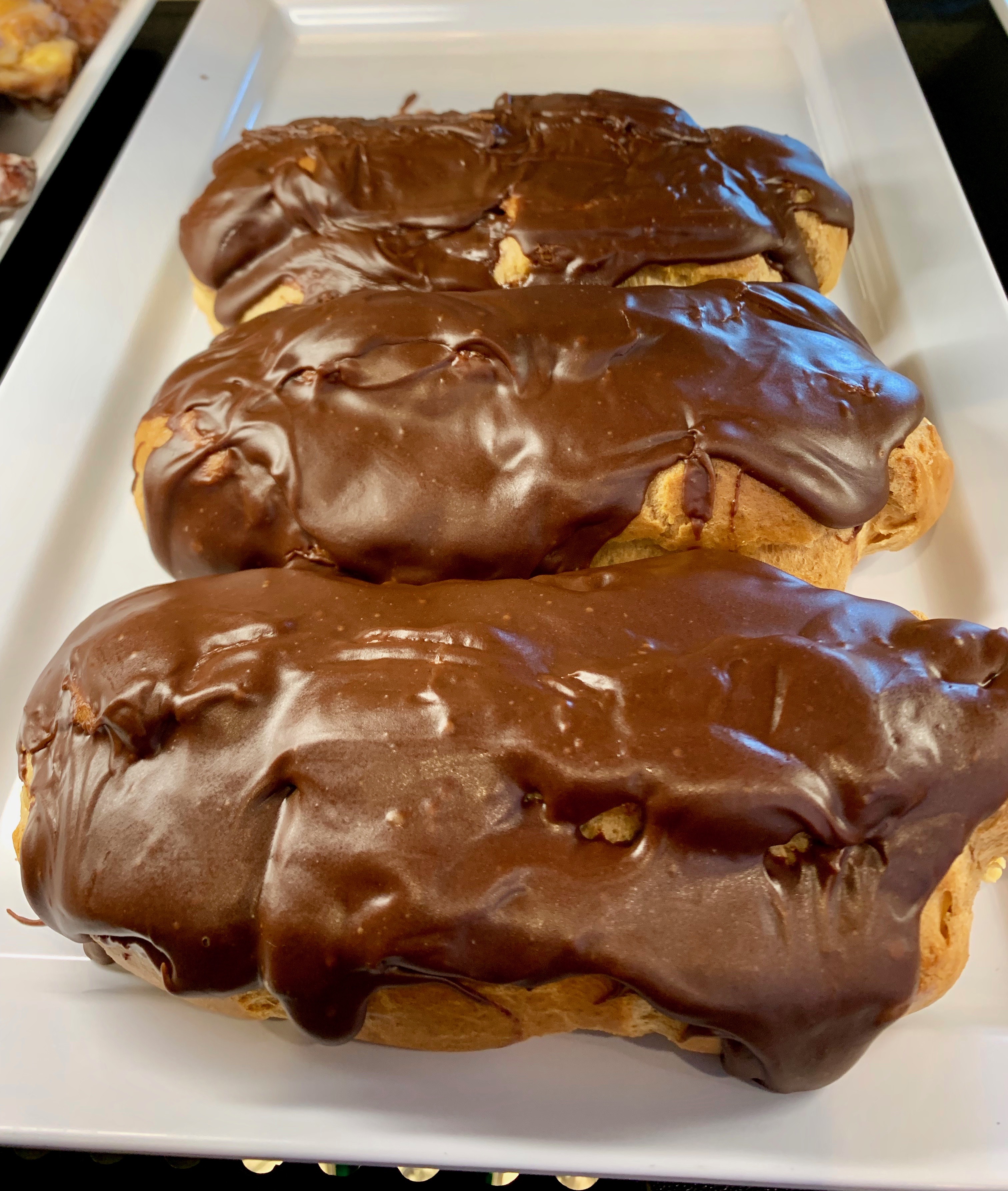 Order Chocolate Eclair food online from The Beanery And Cafe store, California on bringmethat.com