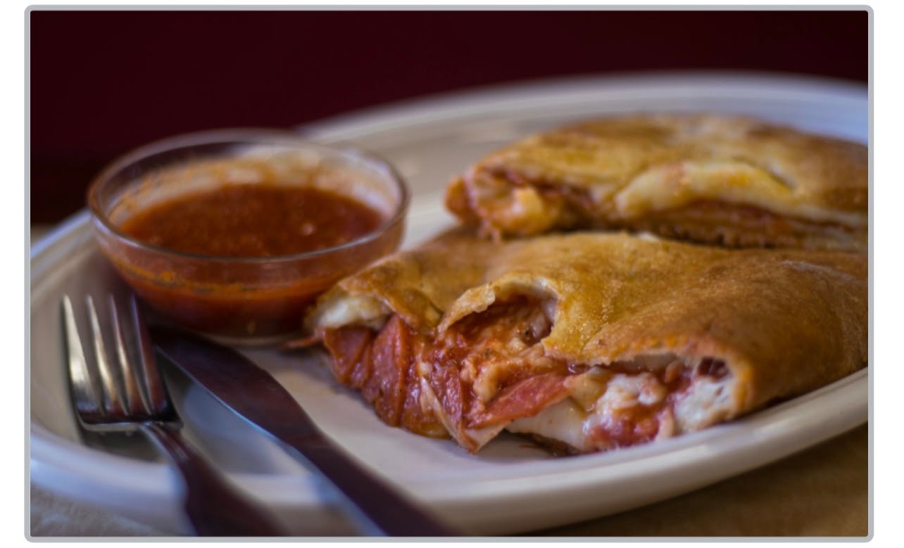 Order Pepperoni Stromboli - Medium food online from Tuscan Pizza store, Sicklerville on bringmethat.com