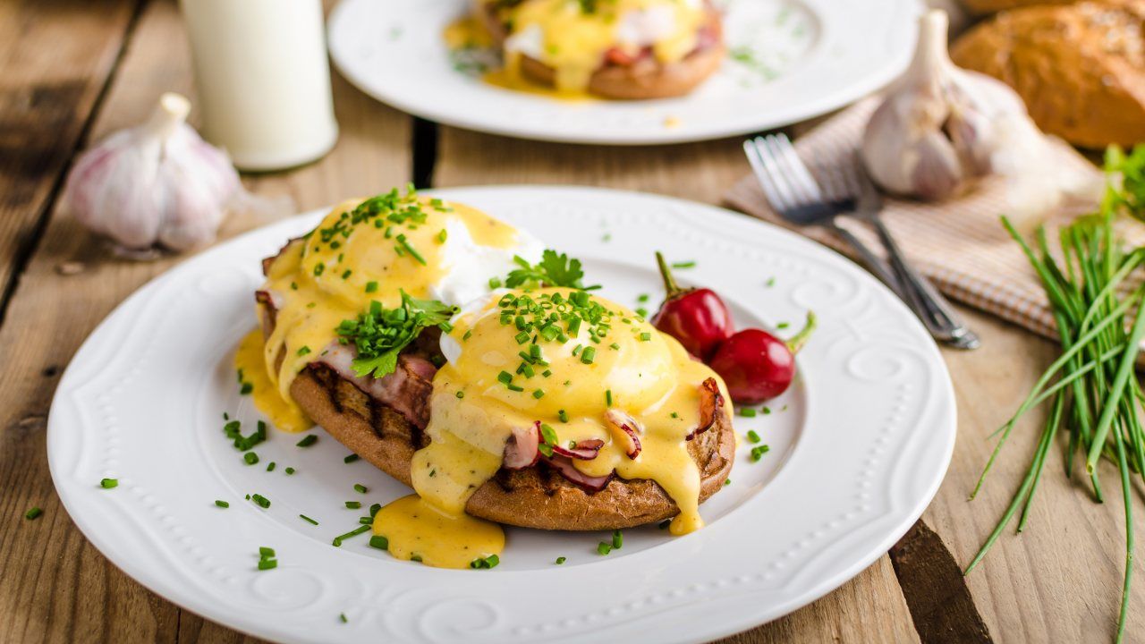 Order Classic Eggs Benedict food online from Baron Steakhouse & Bar store, Garden City on bringmethat.com