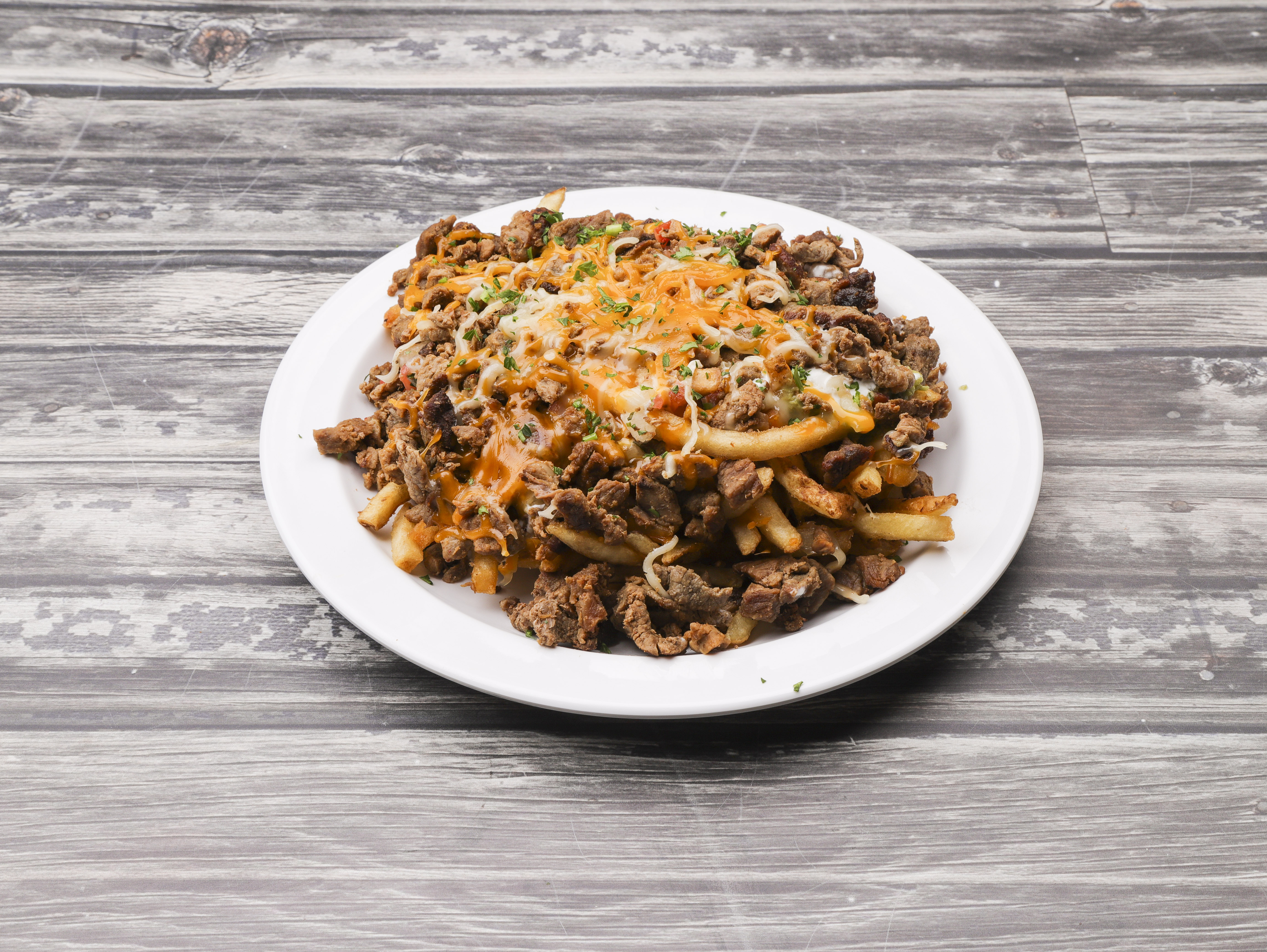 Order Super Fries food online from D'leon Taco Rico store, Lincoln on bringmethat.com