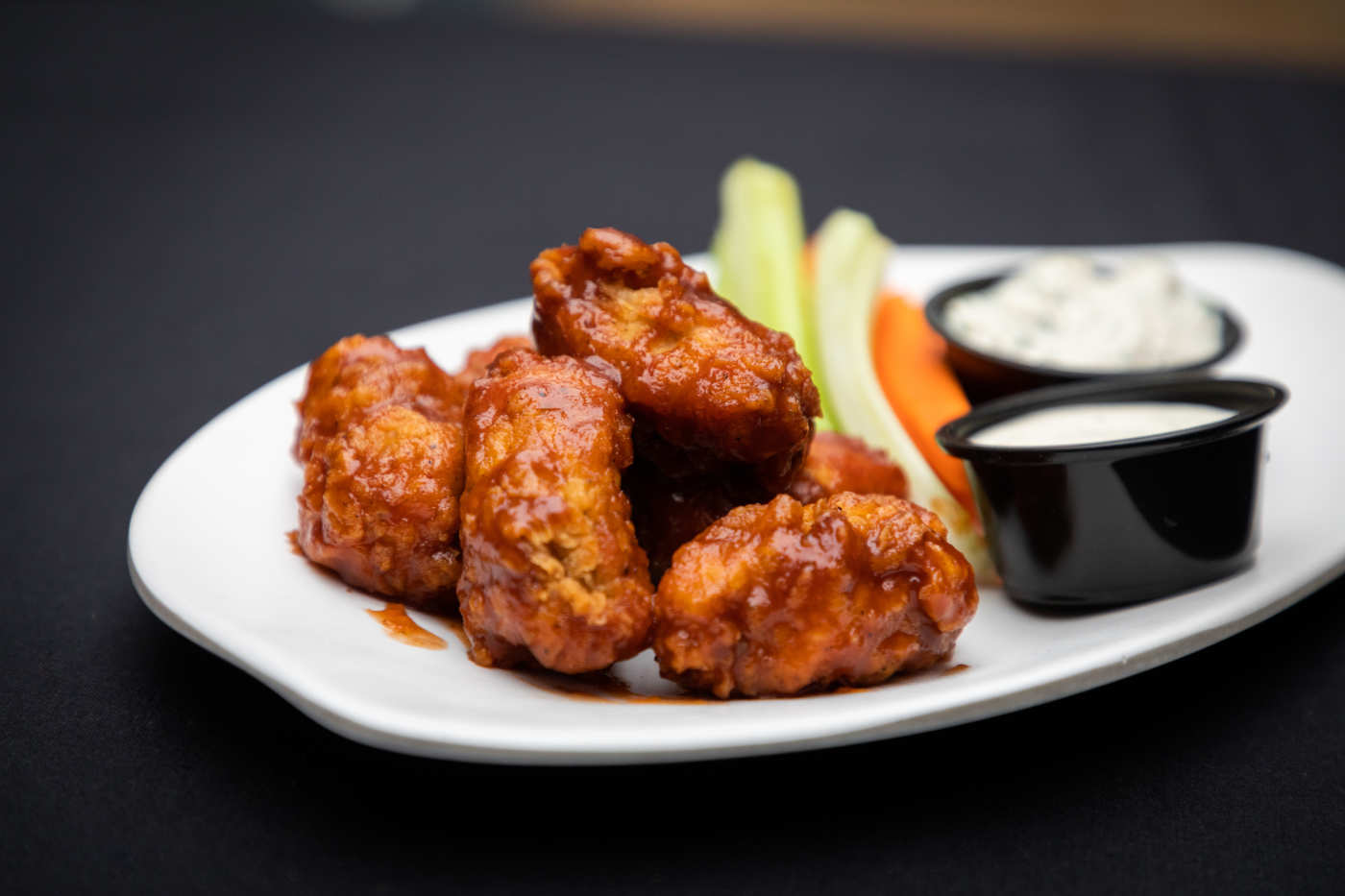 Order Wings food online from Wells Street Pizza store, Chicago on bringmethat.com
