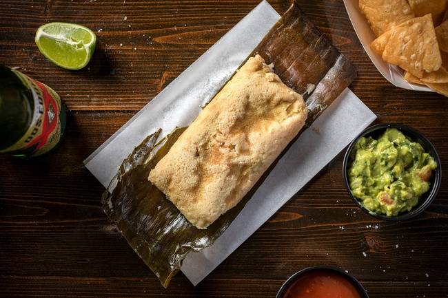 Order Braised Chicken Tamal food online from Flaco's Tacos store, Chicago on bringmethat.com