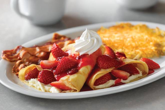Order Strawberry Crêpes Combo food online from Village Inn store, Des Moines on bringmethat.com