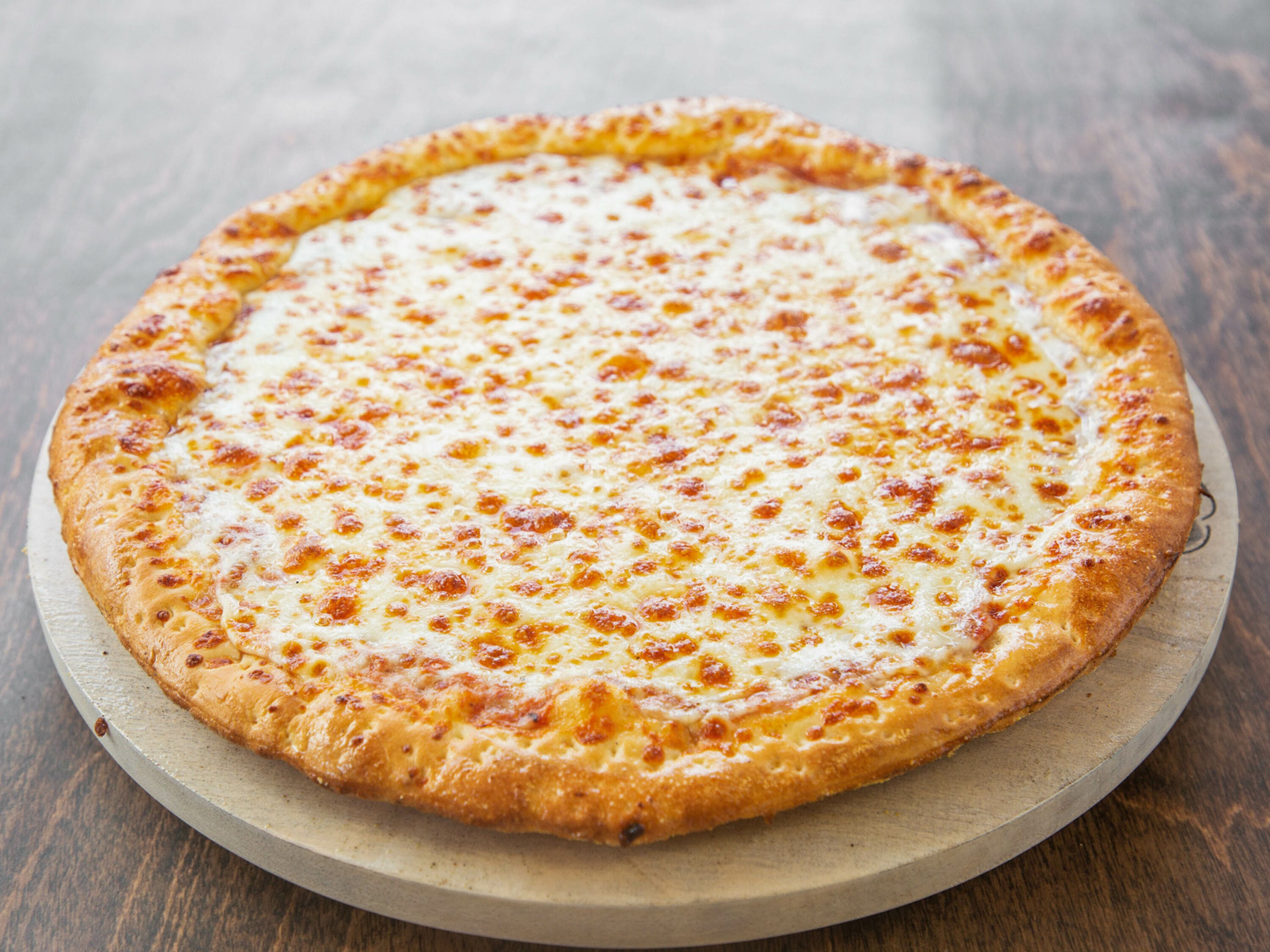 Order One Topping Cheese Pizza - 12'' (8 Slices) food online from Big Daddys Pizza store, South Salt Lake on bringmethat.com
