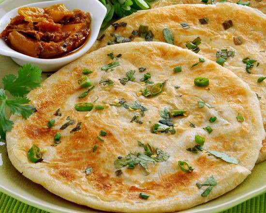 Order Bullet Naan food online from Aroma Indian Restaurant store, Bloomington on bringmethat.com