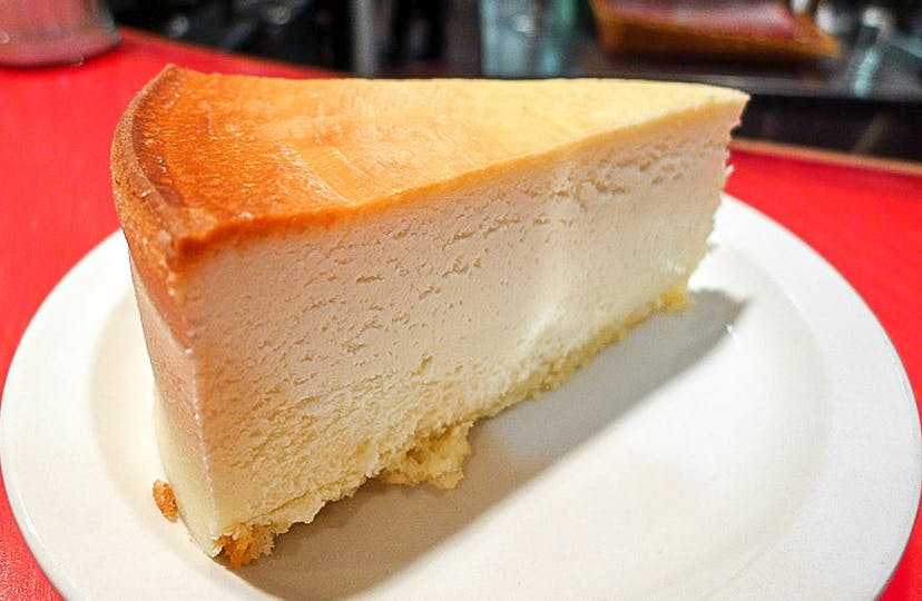 Order Juniors Famous New York Cheesecake - Dessert food online from NYPD Pizza store, Orlando on bringmethat.com