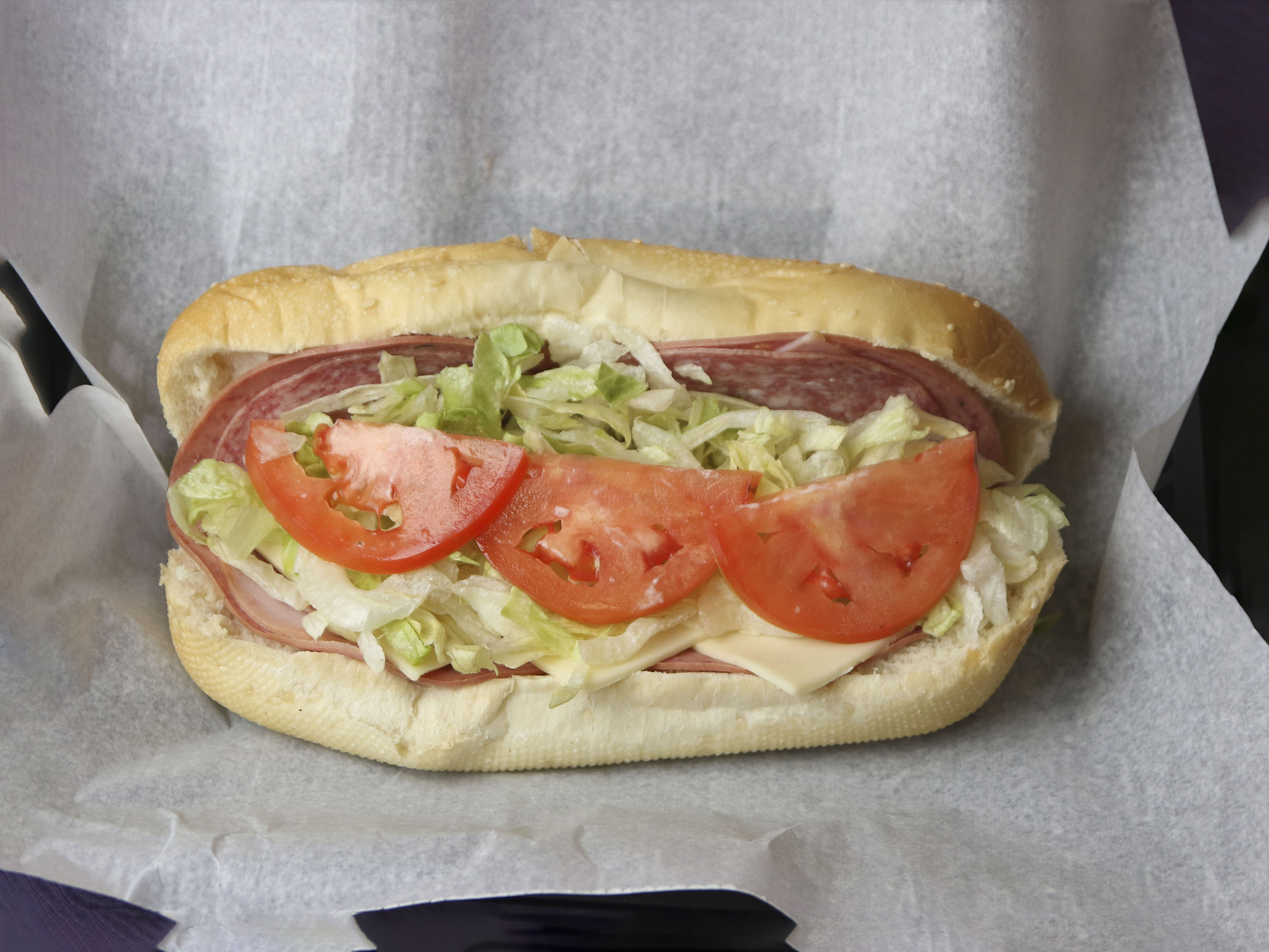 Order Tubby's Famous Sub food online from Tubby's Grilled Submarines store, Sterling Heights on bringmethat.com