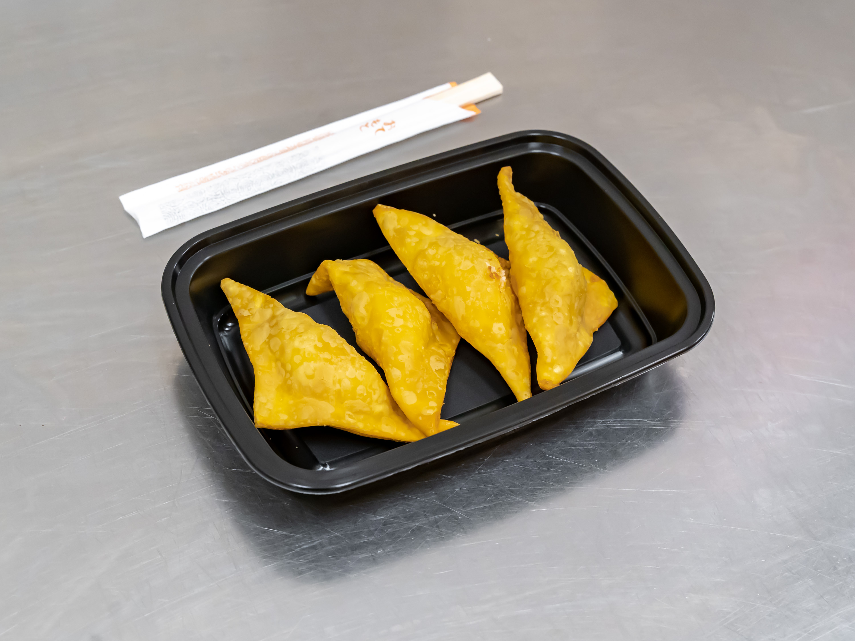 Order 4 Piece Crab Rangoon  food online from Chinese Kitchen 427 store, Willow Grove on bringmethat.com