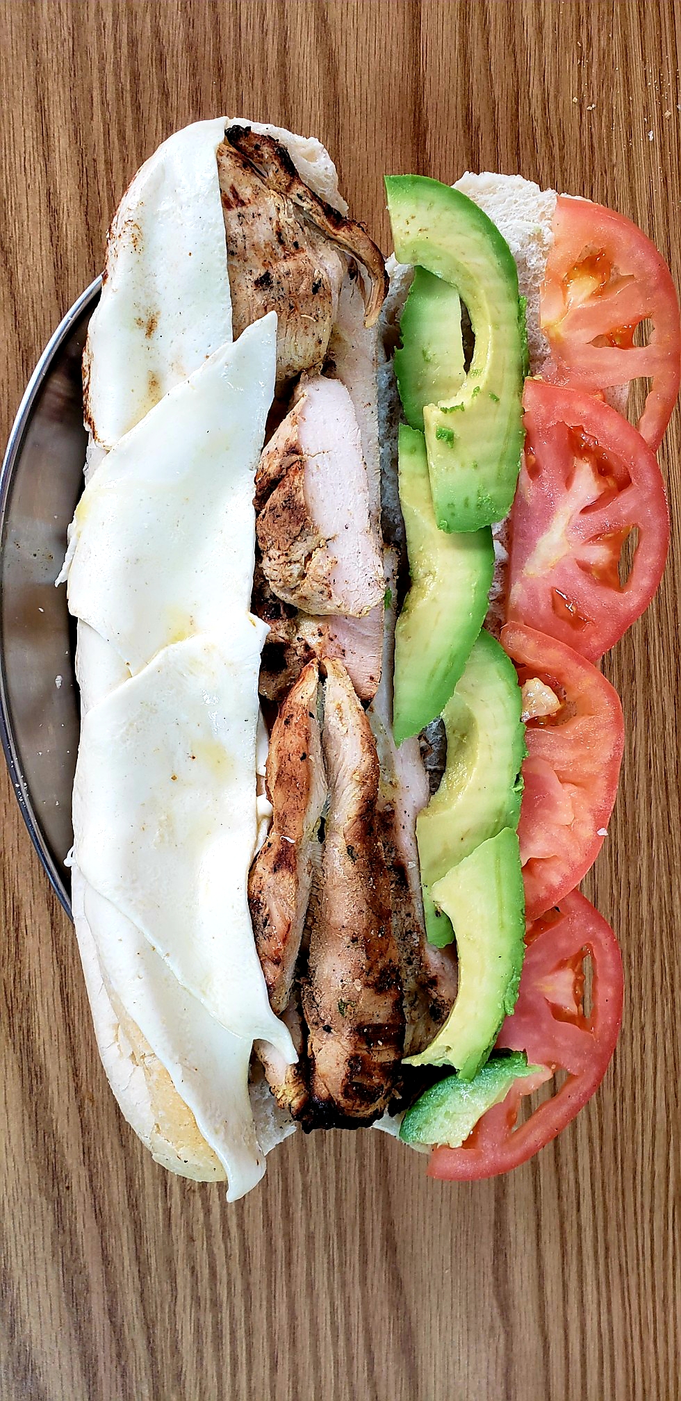 Order  California Signature Sandwich (grilled chicken avocado fresh mozzarella tomatoes & Mayonnaise) food online from American Gourmet Foods Deli store, New York on bringmethat.com