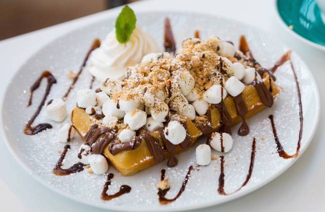 Order S'mores Waffle food online from Sweet Paris Creperie store, Houston on bringmethat.com