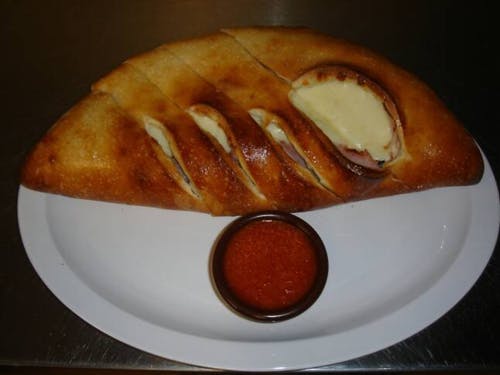 Order Calzone - Small food online from Leola Pizza Place store, Leola on bringmethat.com