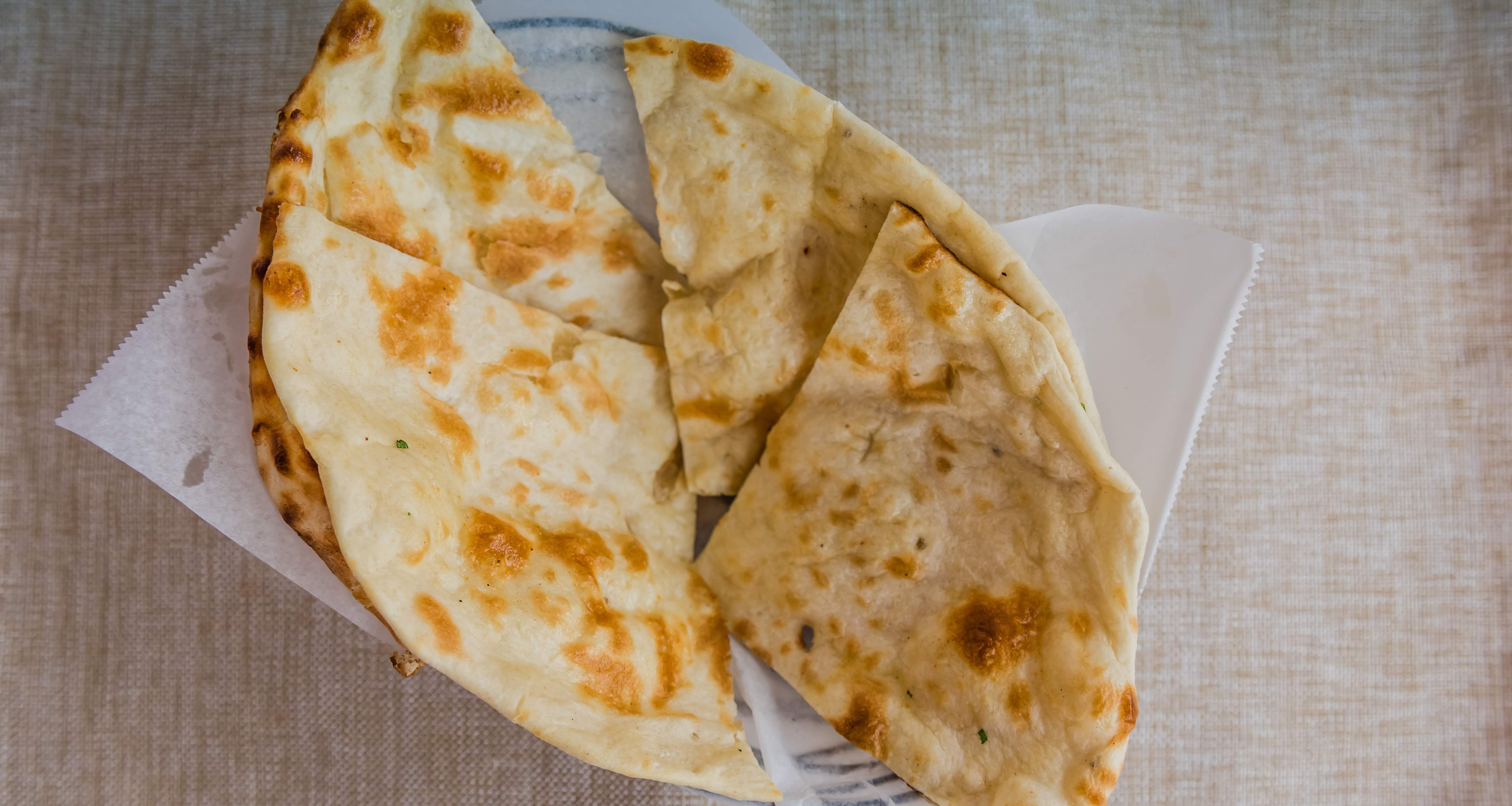 Order Butter Naan food online from Tandoor Restaurant - Nepalese & Indian Cuisine store, Pinole on bringmethat.com