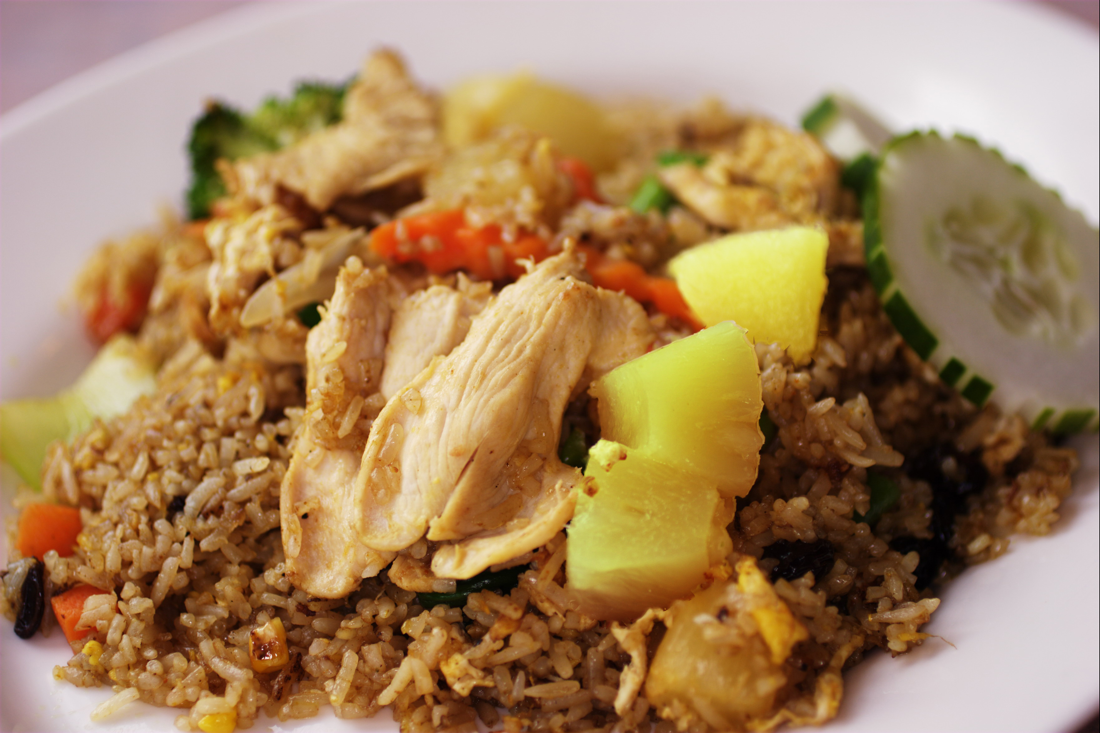Order Pineapple Fried Rice food online from Noodle Street Thai Restaurant store, Boston on bringmethat.com