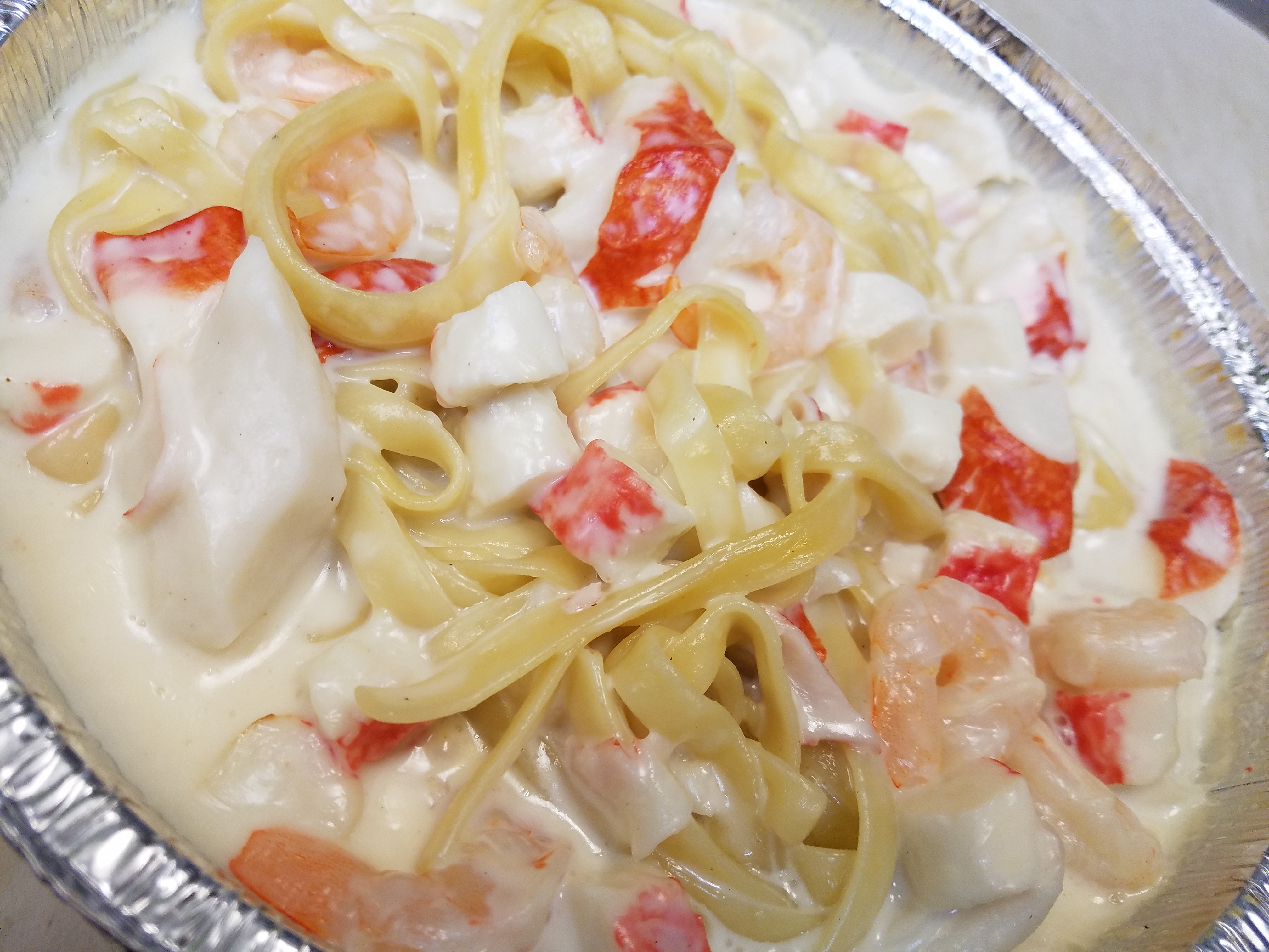 Order Seafood Pasta food online from Vinny's Pizza store, Pittsburgh on bringmethat.com