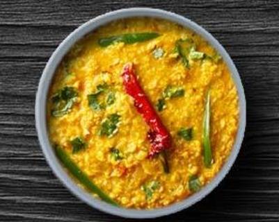 Order Bright Yellow Lentils  food online from Tick-Tock Tikka House store, Cary on bringmethat.com