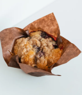 Order Bluberry Muffin by Canela Kitchen food online from Nerve Coffee store, Brownsville on bringmethat.com