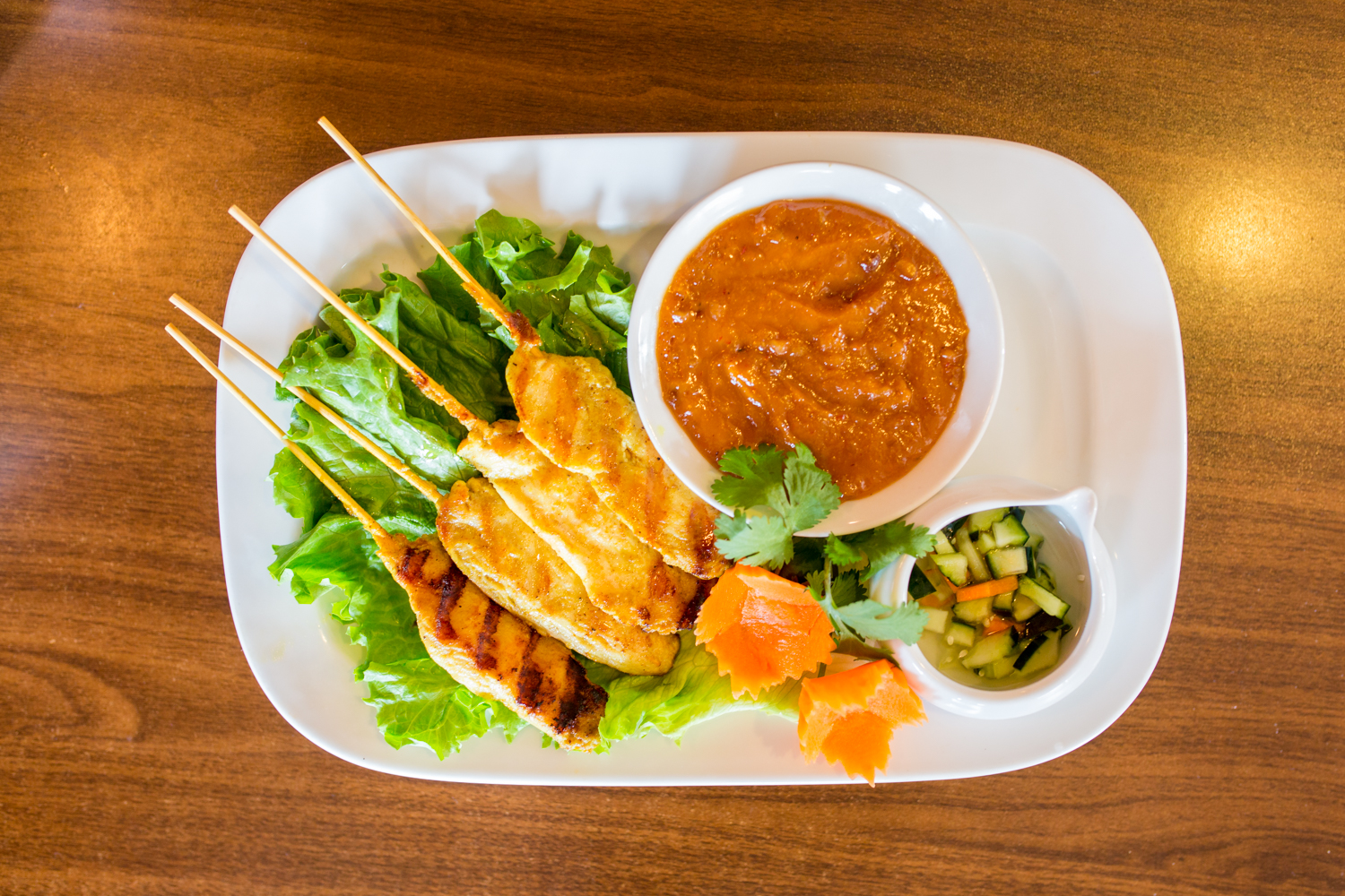 Order A7. Chicken Satay food online from Chaang Thai store, Colorado Springs on bringmethat.com