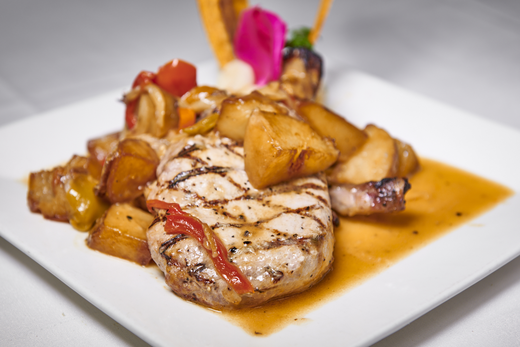 Order Pork Chop food online from Magno Grill store, New Rochelle on bringmethat.com