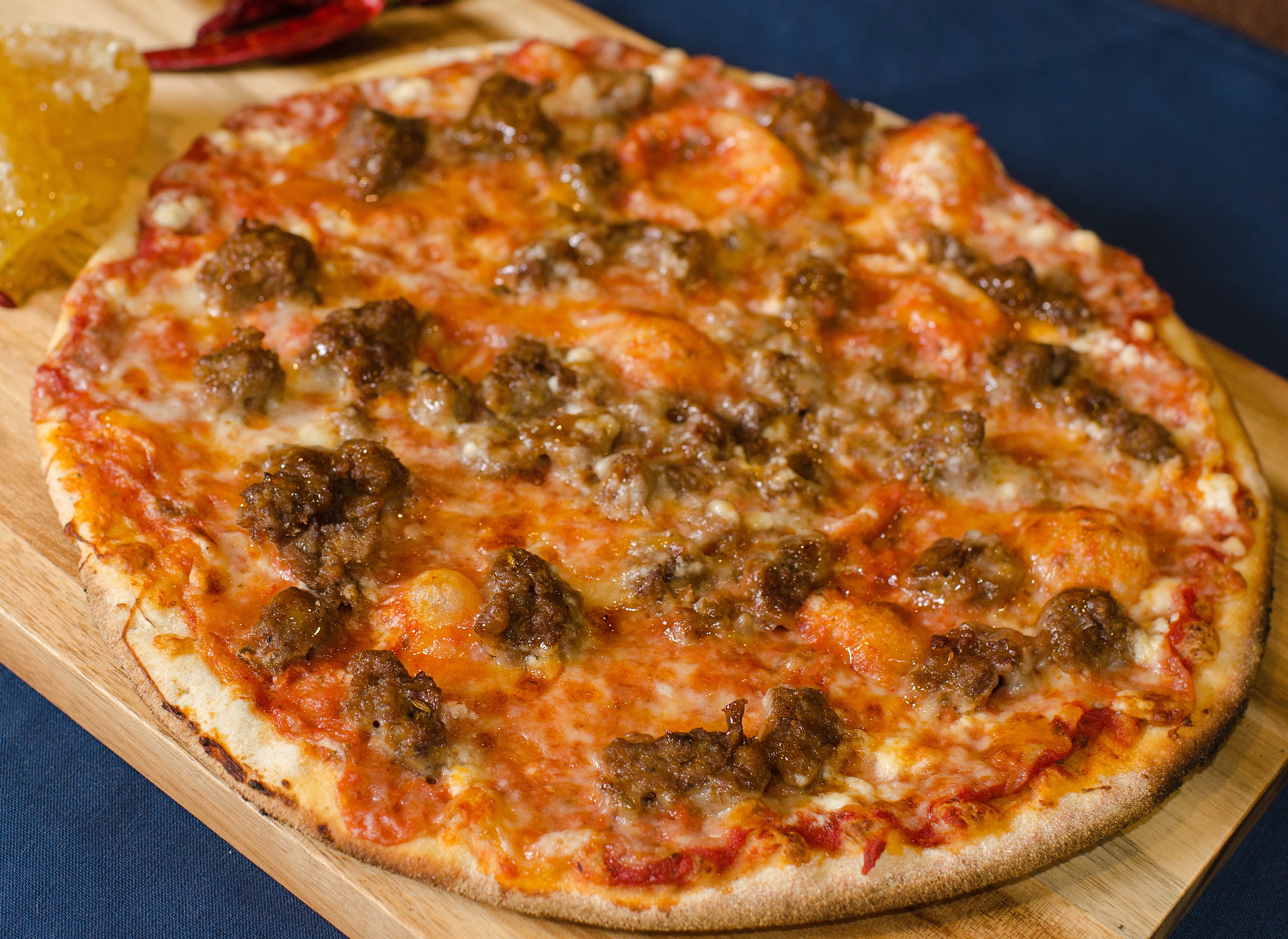 Order Sausage and Spicy Honey Pizza food online from Brixx Wood Fired Pizza store, Greensboro on bringmethat.com