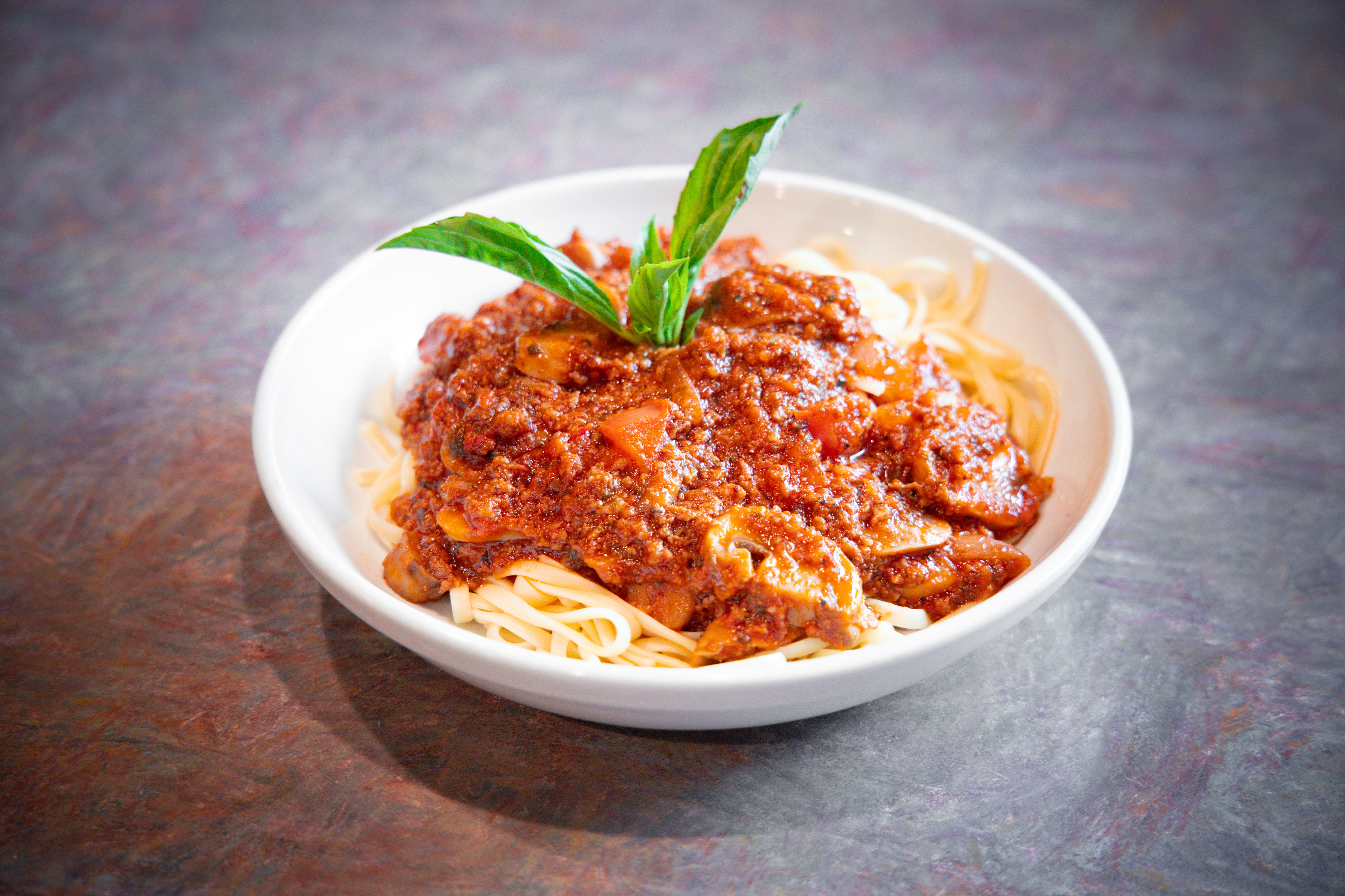 Order Pasta Bolognese with Mushrooms - Pasta food online from Anthony Restaurant store, Torrington on bringmethat.com