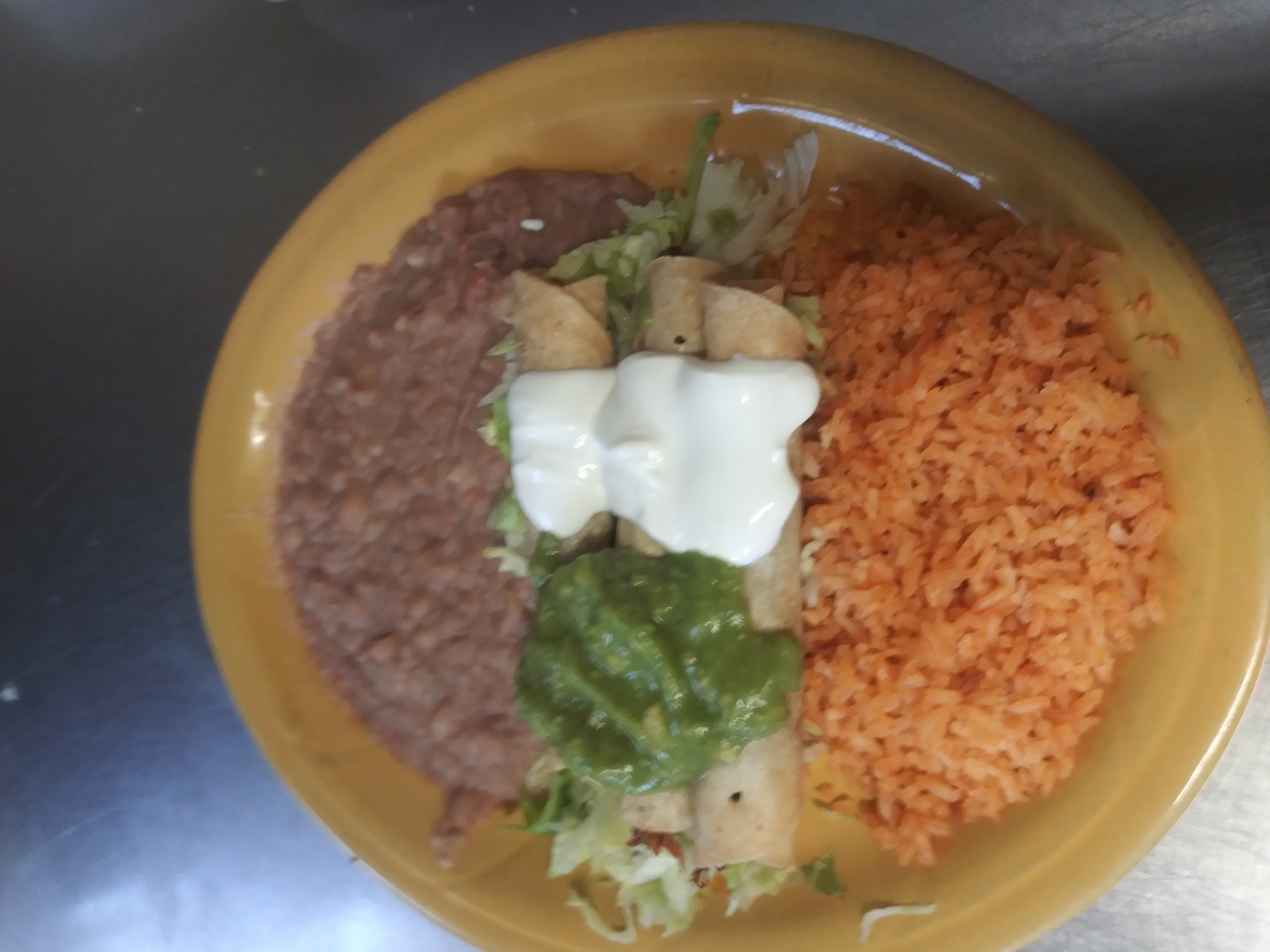 Order 23. Flauta Plate food online from G and R Restaurant store, El Paso on bringmethat.com
