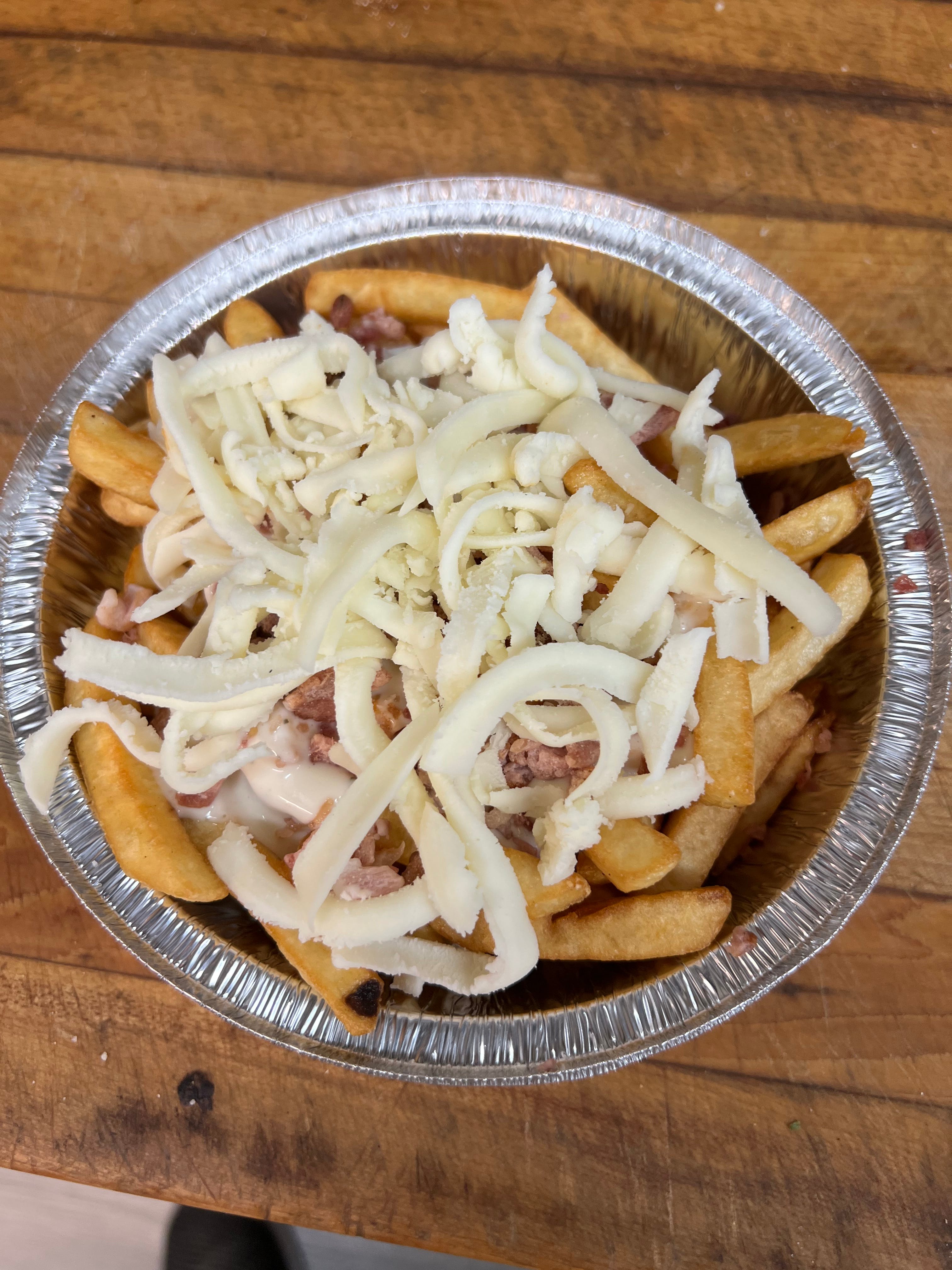 Order Bacon & Cheese Fries - Side food online from Andre's Pizza store, Oxford on bringmethat.com