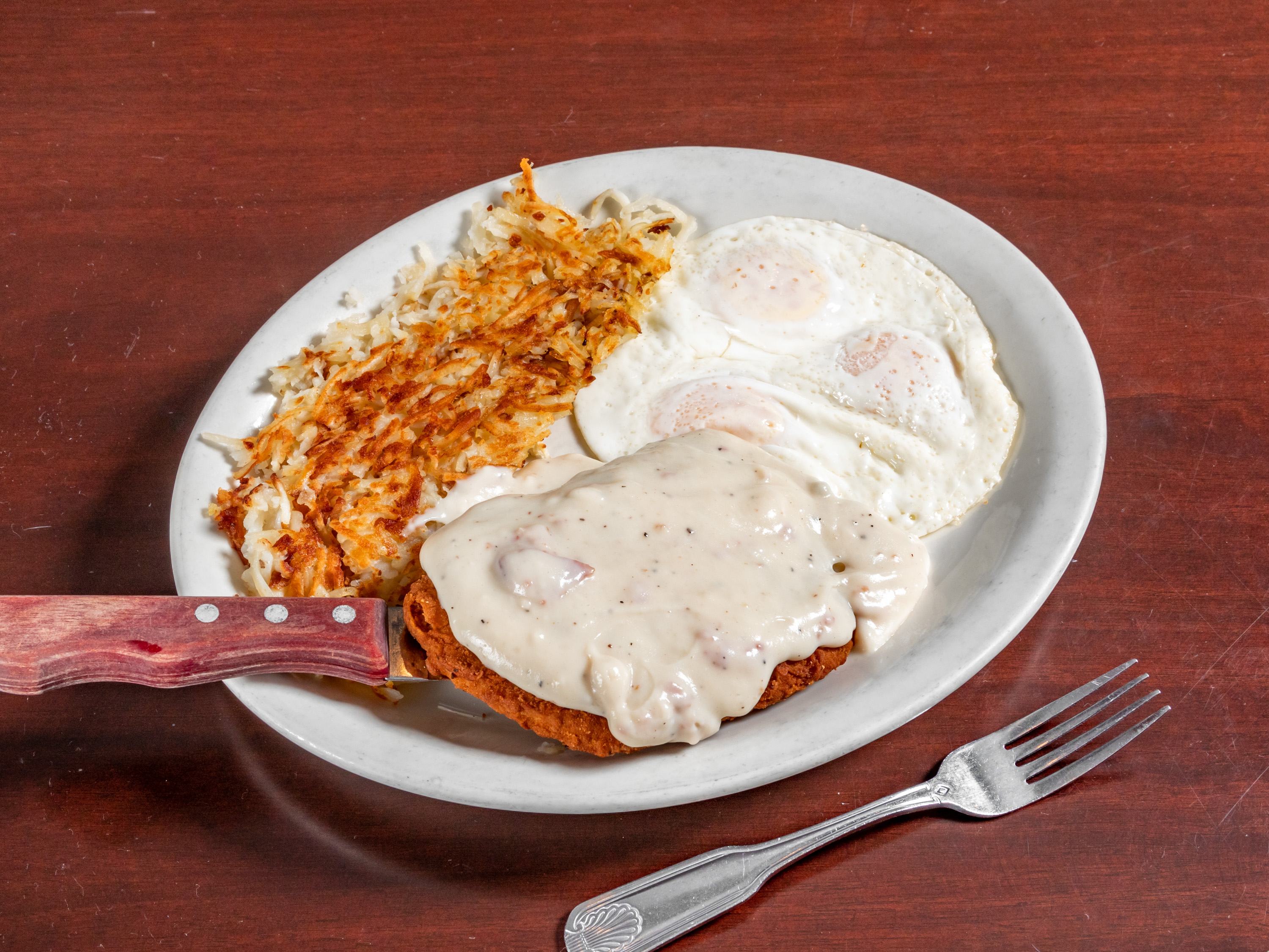 Order Country Fried Steak and Eggs food online from Cappy's Cafe store, Newport Beach on bringmethat.com