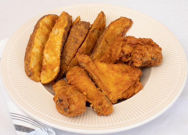 Order Dark Chicken Dinner - 2 Pieces & 6 Jojos food online from Emidio & Sons store, Akron on bringmethat.com