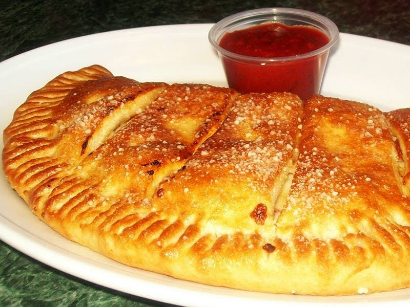 Order Cheese Calzone - Calzone food online from Pizzoli Pizza store, Washington on bringmethat.com