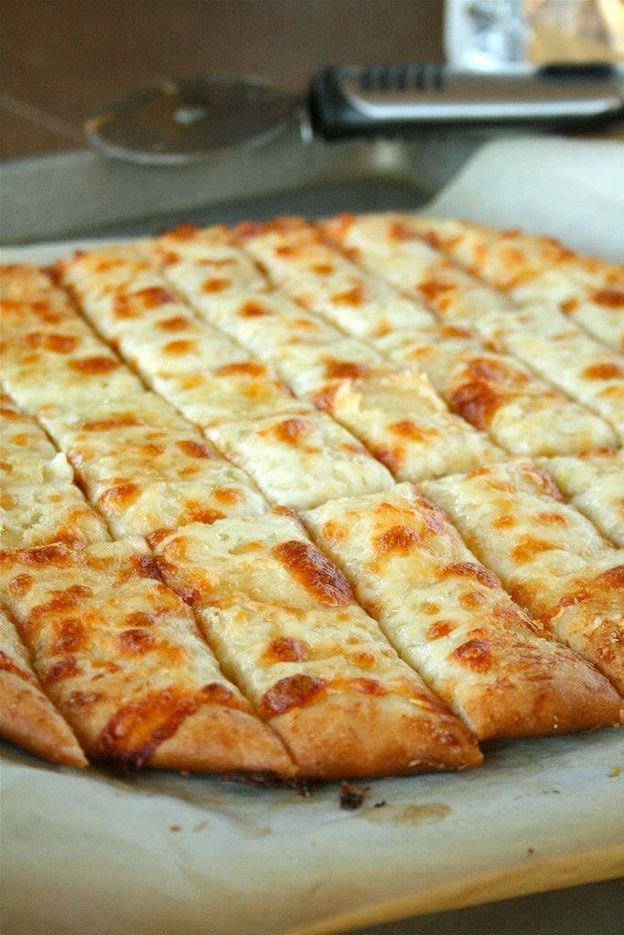 Order 10 Pieces Cheesy Garlic Bread Sticks food online from New York Pizza & Pasta store, San Leandro on bringmethat.com