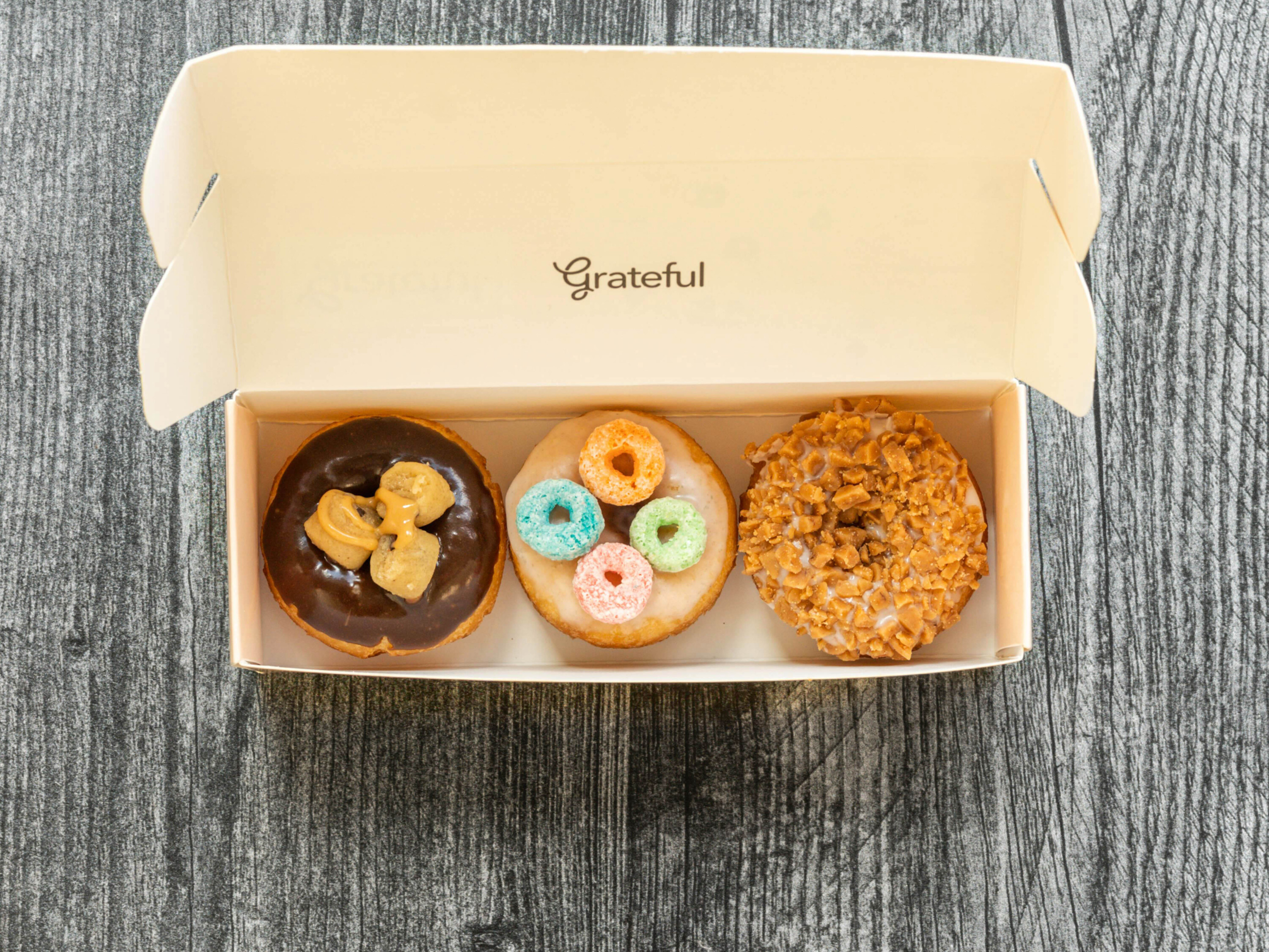 Order 3 mini-Donuts in a box food online from Berry Station / Grateful Donut Co store, Kaysville on bringmethat.com