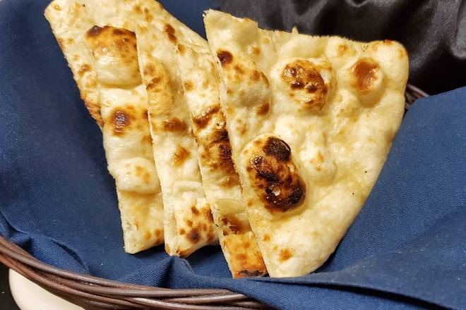Order Butter Naan food online from Melange store, Parsippany-Troy Hills on bringmethat.com