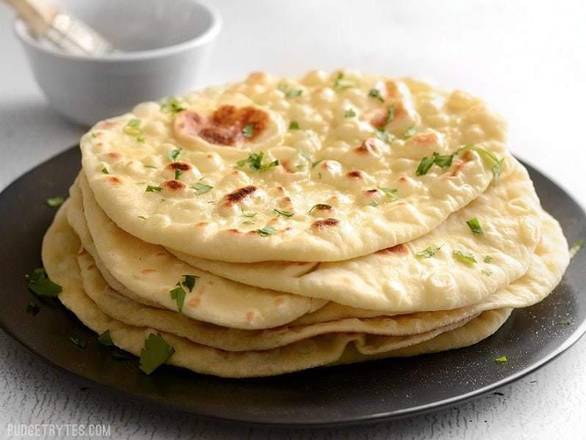 Order Special Naan food online from Sansar Indian Restaurant store, Tracy on bringmethat.com