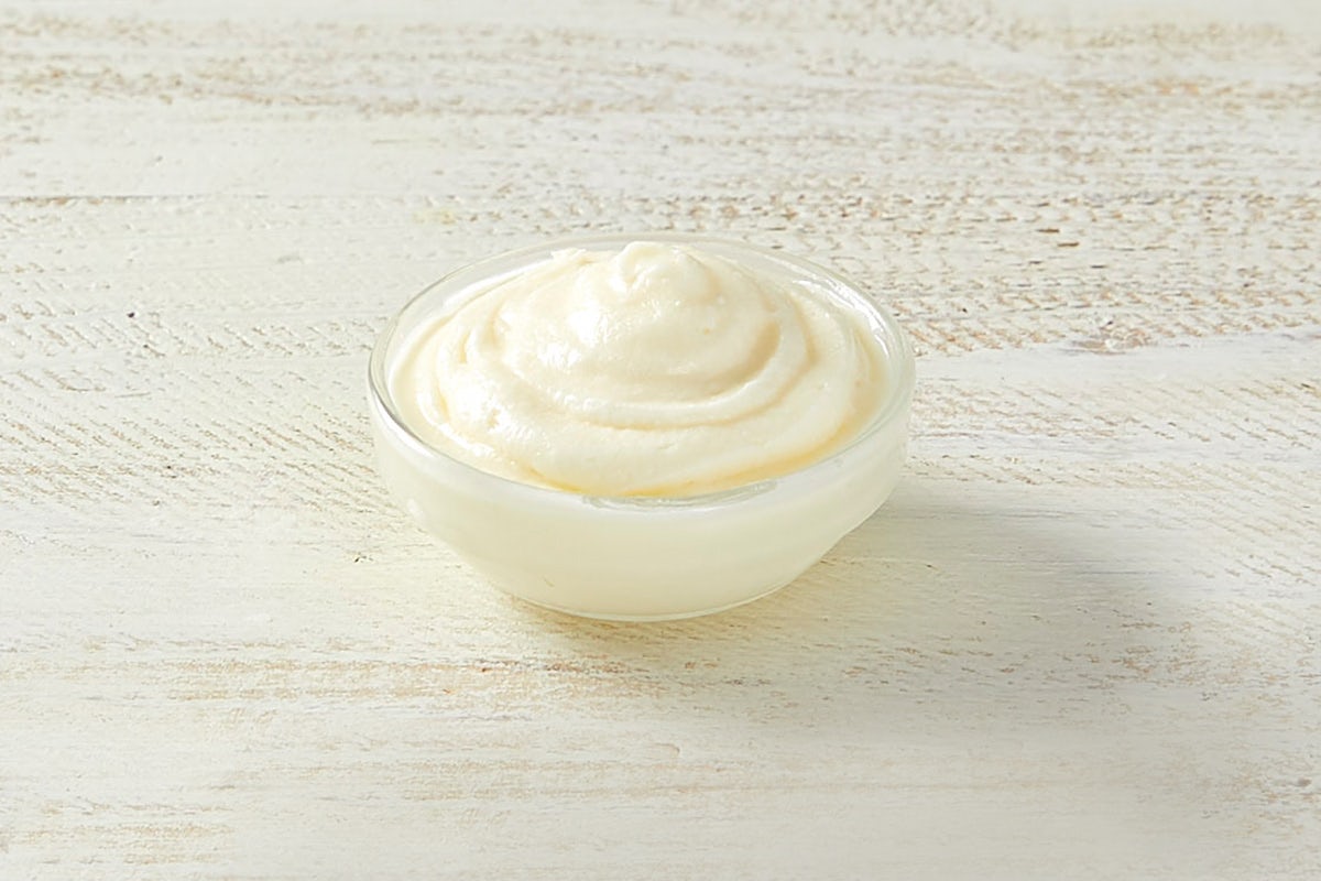 Order Side of Cream Cheese Frosting food online from Cinnabon store, Anchorage on bringmethat.com