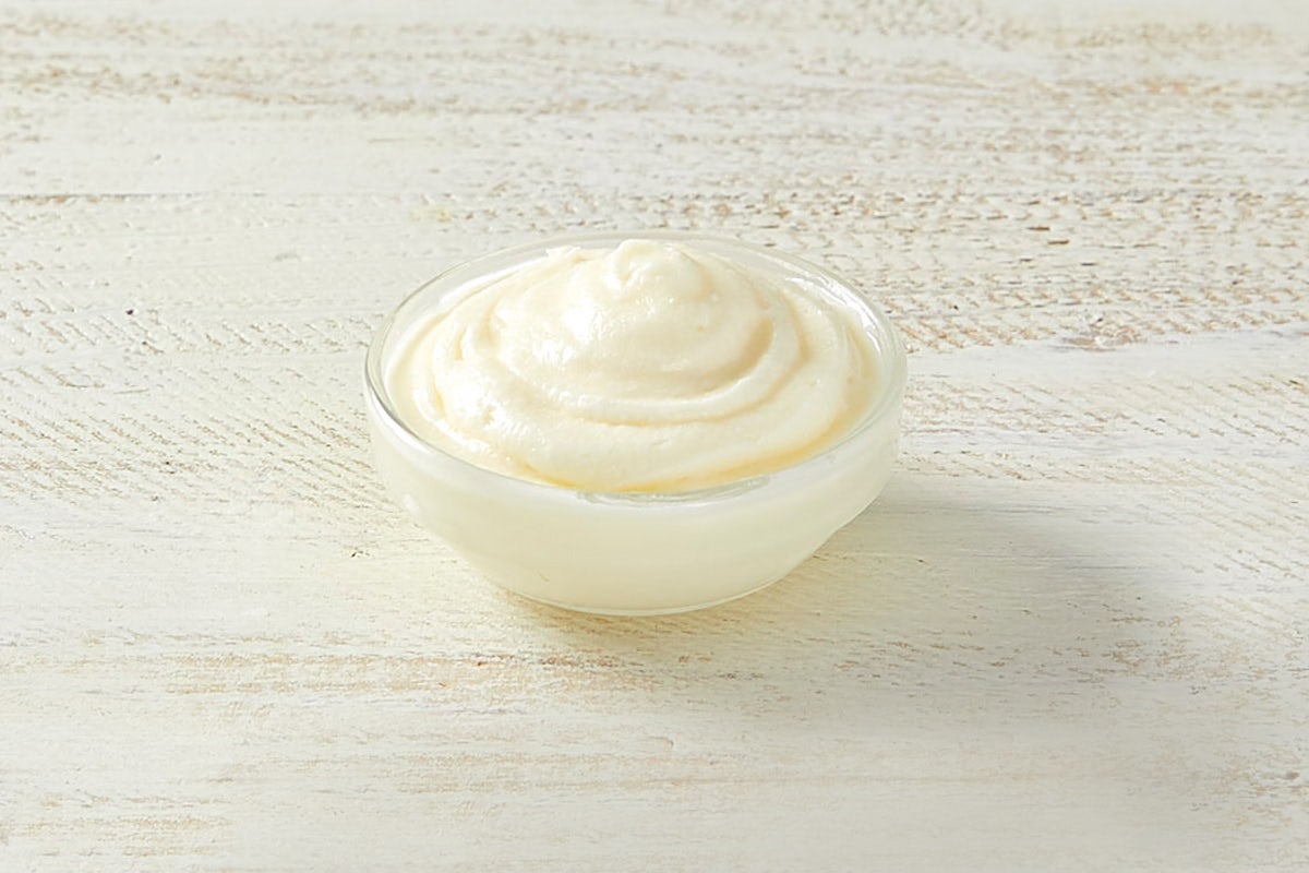 Order Side of Cream Cheese Frosting food online from Cinnabon store, Dublin on bringmethat.com