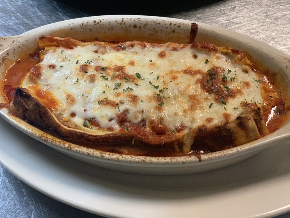 Order Lasagna - Pasta food online from Luigis Italian Restorante store, Gainesville on bringmethat.com