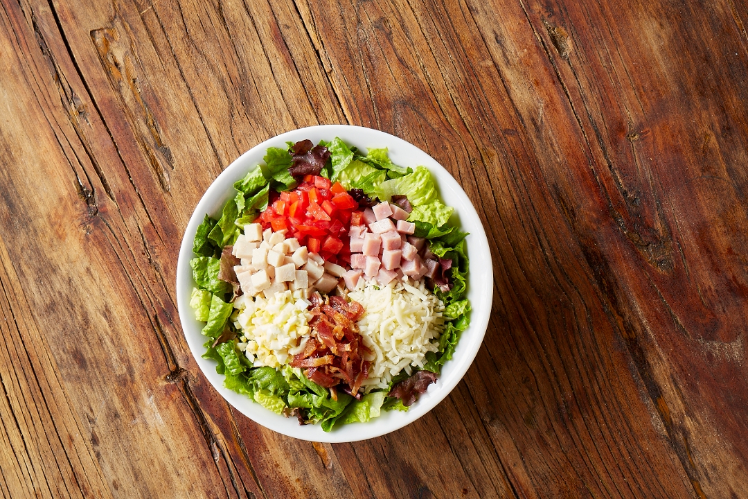 Order CHOPPED COBB SALAD food online from Uncle Maddio's store, Charlotte on bringmethat.com