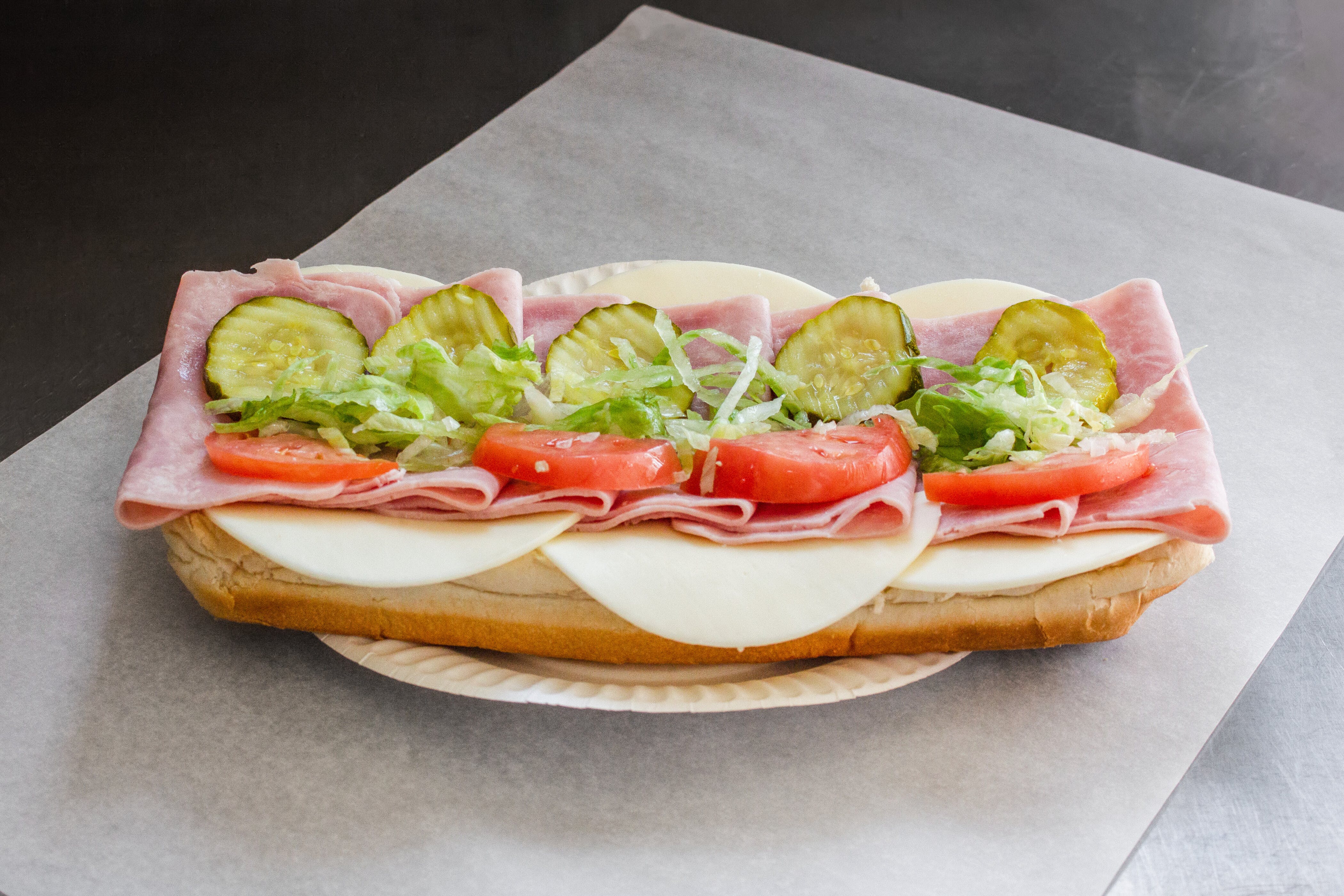 Order Ham Sub - Small food online from Town House Of Pizza store, Westminster on bringmethat.com